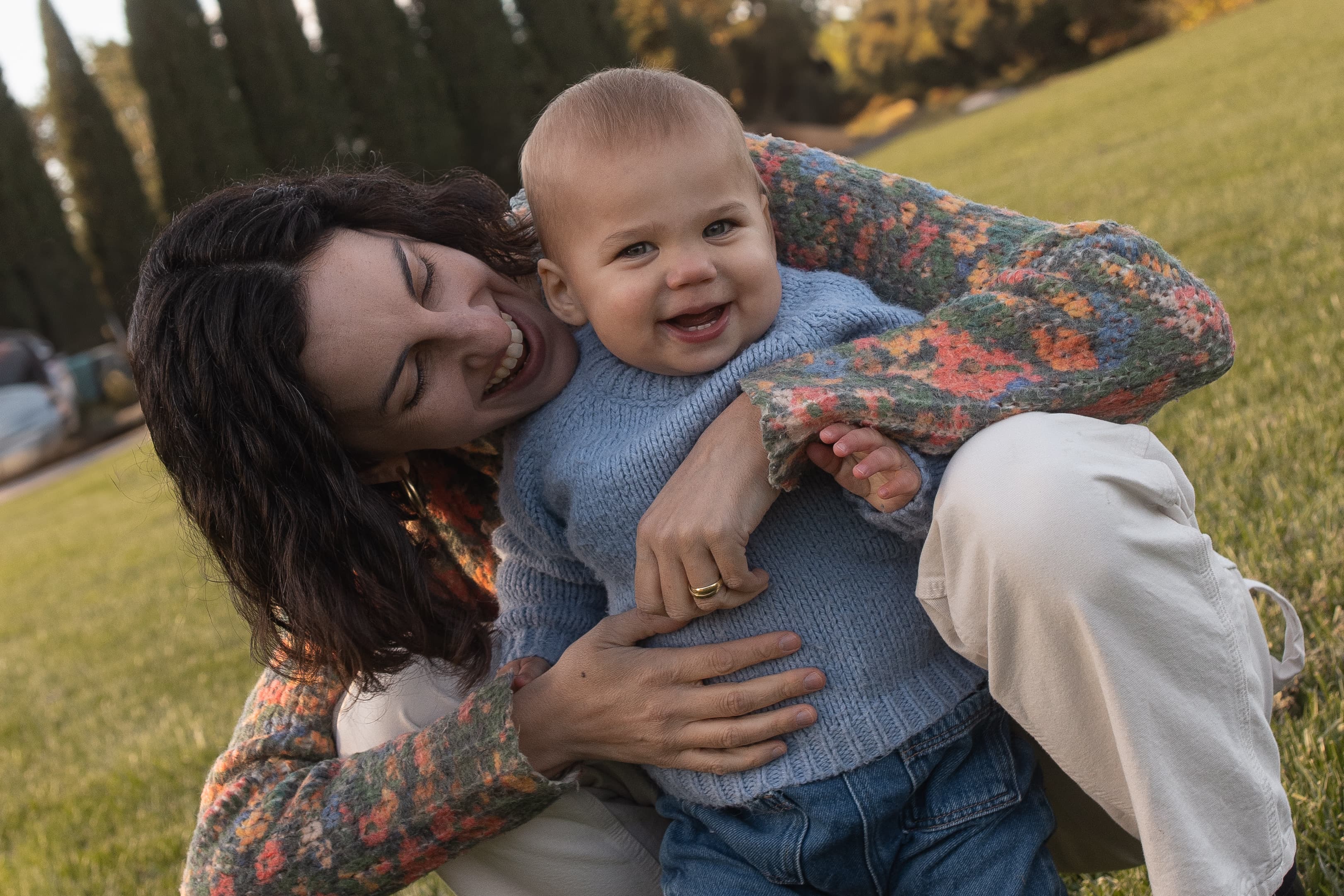 Mother and baby laughing together